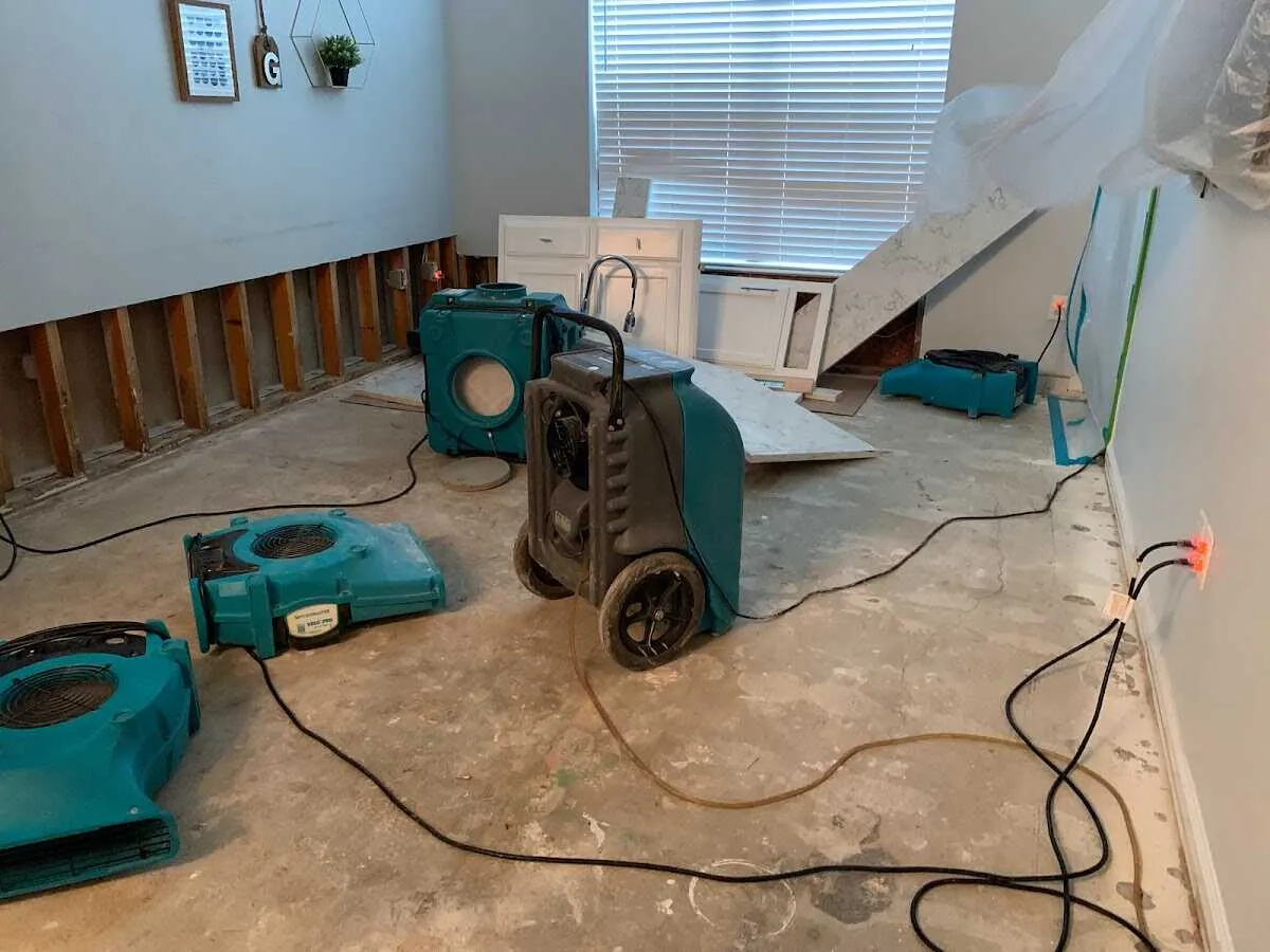 Dehumidifier in flood-cut room for Water Damage Restoration in Whispering Pines